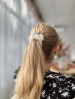 Balta vidutinė šilko gumelė Balta vidutinė šilko gumelė